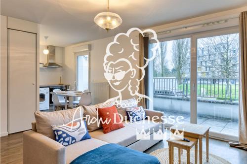 Le Nicole un appartement en duplex avec balcon et place de parking