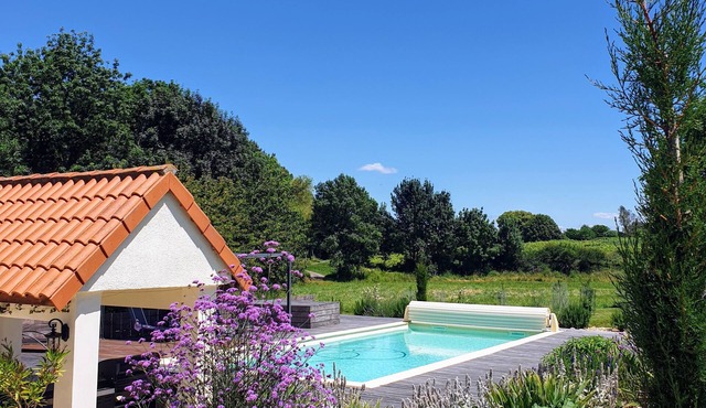 Le Petit Pas Gite in a tranquil setting surrounded by vineyards and sunflowers