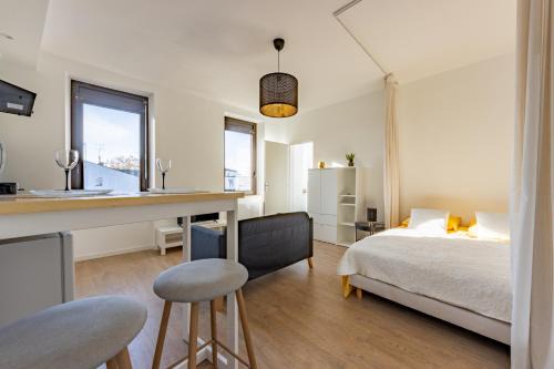 Le studio Sicre proche commdités parking facile