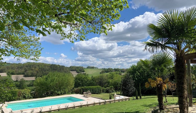 Le Tilleul, an intimate mezzanine cottage on the side of a hill. Superb views