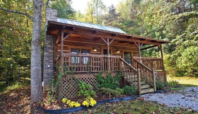 Leave the stress behind!- private hot tub, pet and motorcycle friendly, let peace and nature surround you! by RedAwning