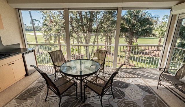 Lely 2nd Flr Condo w/tranquil golf course views from private screened lanai; Players Club Option
