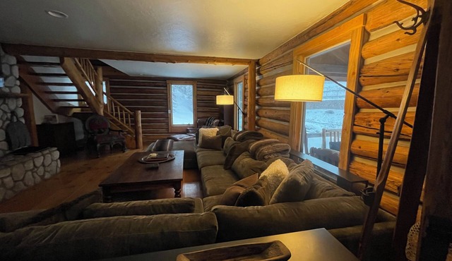 Lena's Cabin in Vail is nestled right beside Gore Creek, minutes from skiing.