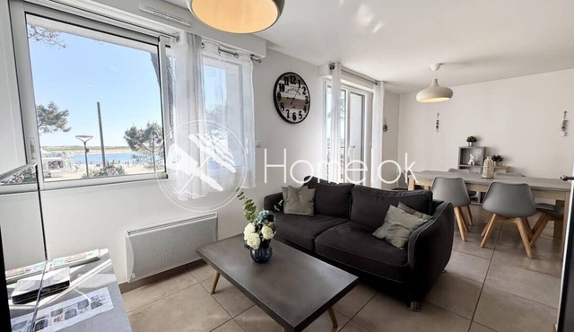 Les pieds dans l'eau - Beau T2