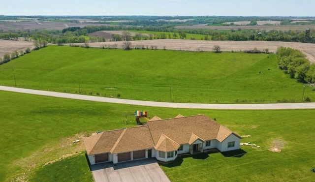 Less than one mile from the ATV Trail with a hot tub on deck to end your day!