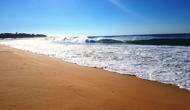 Let the waves hit your feet, let the sand be your seat!nbeach across the road!