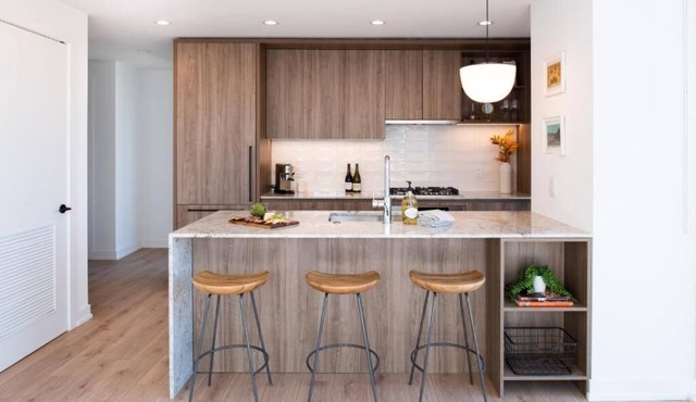 Level Spacious one bedroom suite with king bed, walk-in closet, full kitchen.