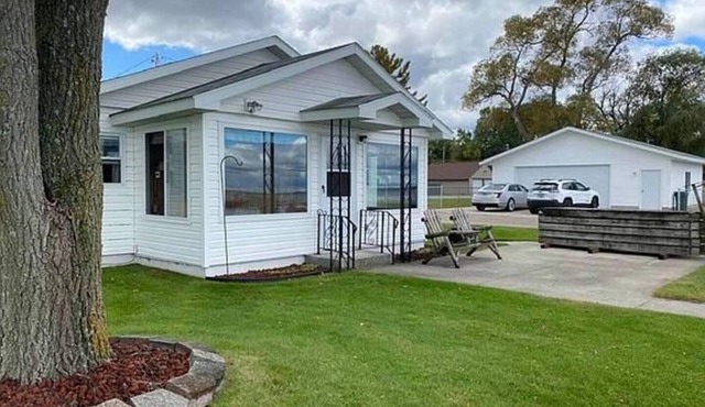 Life is Better at the Lake! Over 120 ft of frontage on Houghton Lake!
