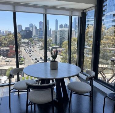 Light-Filled Apartment with City Views & Free Parking