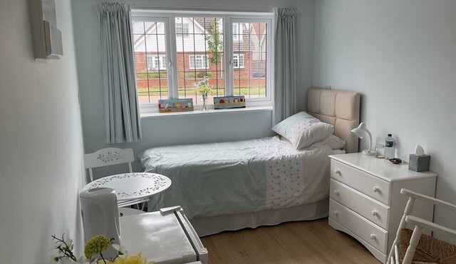 Light-filled en-suite room just moments from the sea