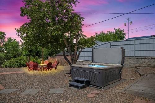 Light-filled home with outdoor hot tub and firepit