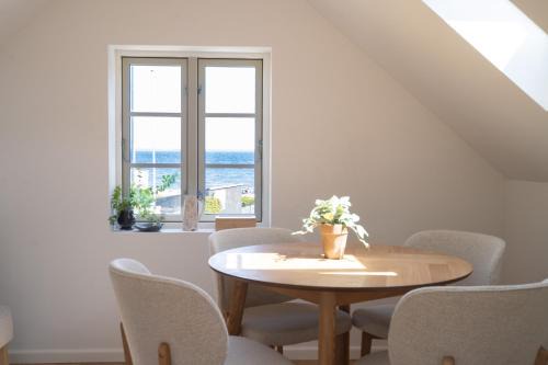 Lille villa med havudsigt og sauna