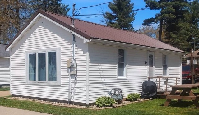 Lilly Pad North, Cottage #4 is on Shawano Lake, nestled among 4 other cottages. Beautifully located. Relaxing days on the beach and sunsets by the firepit are the best.