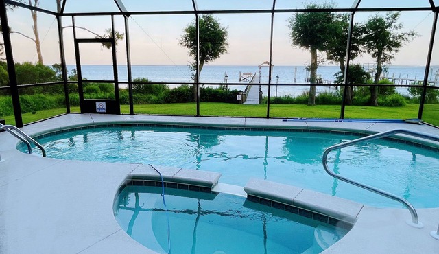 Lily’s Escaped, Private screen cover pool, fishing dock,
