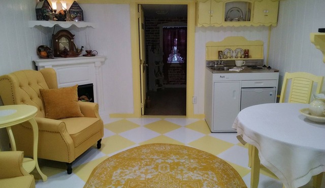 Little Cottage Quiet and Quaint where the grapevine grows and the birdsongs wait