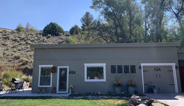 Little Den is an efficiency, cabin located on the Big Laramie River.