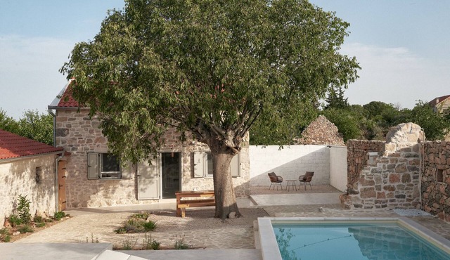 Little Stone House With Swimming Pool Under The Tree