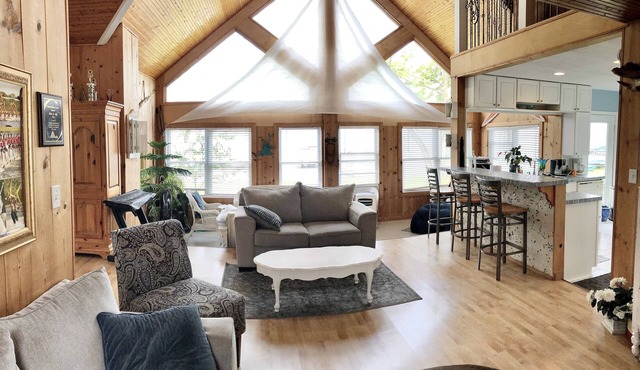 Little White Cottage on Chippewa Lake just steps to the waters edge.