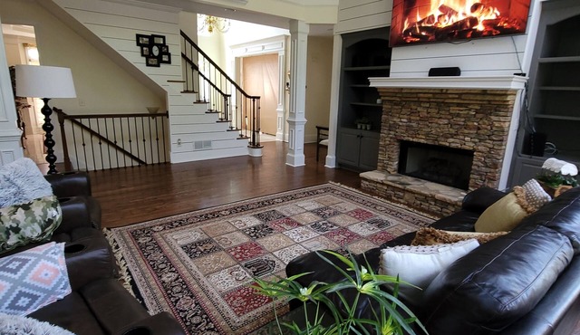 Live in a mansion near the city, offering a resort-style setup.