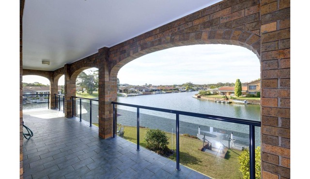 Live the Waterfront Dream in this Exquisite Family Home!