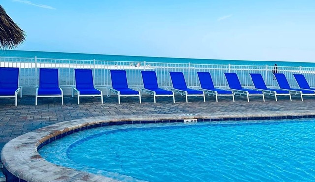 “ Living the Dream “ in our 3 bedroom 3 bathroom beachside condo with pool!