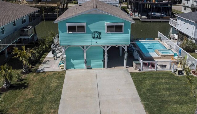 "Living the Dream"- Canal Bay home with Pool! -2 night minimum stay. No Pets