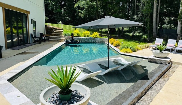 Living the Dream: Luxurious Lakeside Home with New Private Pool and Poolhouse