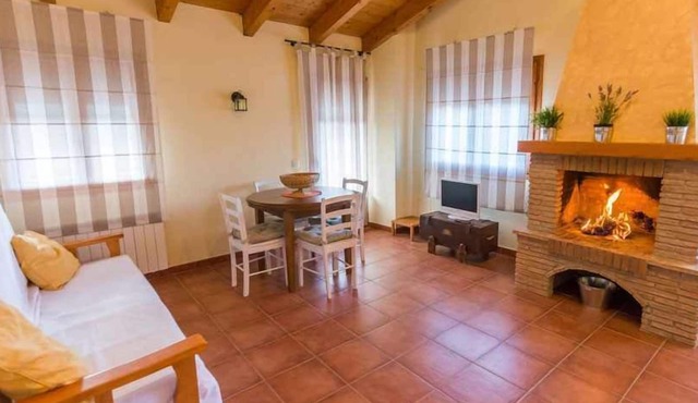 Lo Tossal I. Penthouse with fireplace and terrace