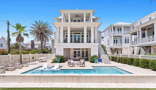 Loaded All Suite Home with Gulf Views, Pool, Elevator, Putting Green, and more!