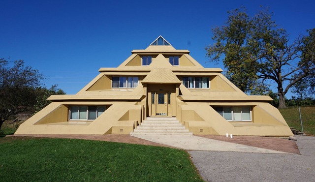 Locally Known as The Pyramid House w/5,000 Sq Ft of Living Space 6 BRs & 3 Baths