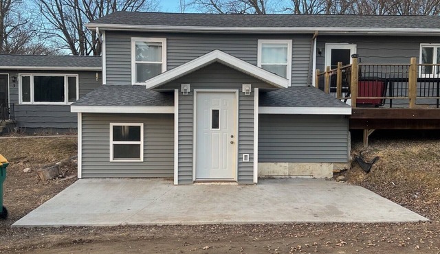 Located across the road of West Lake Okoboji. 8 beds. Room for parking trailers