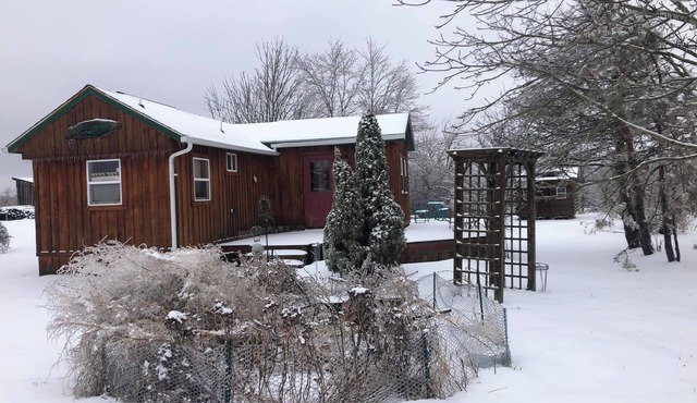 Located behind a tree filled garden near our horse barn and Farm Sanctuary.