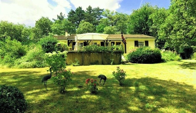 Located in a tranquil woodland setting.