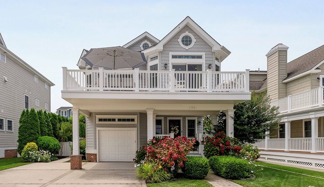 Located in the much sought after neighborhood of the 30's and just five homes to the beach,