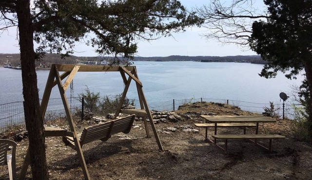 Located on a bluffcliff, 80 ft off the water with a magnificent view of the Lake