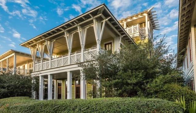 Located right on 30A, '57 Western Lake Drive' is a 6BR/6.5BA Home + Carriage House