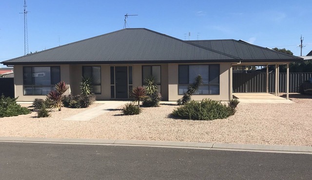 Located within walking distance to Beautiful Simms Cove in a quiet Cul-de-Sac