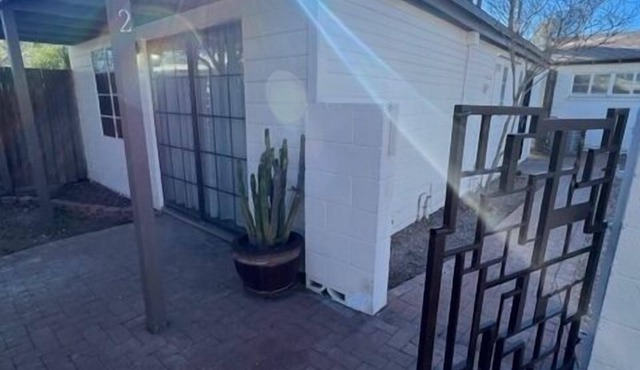 Location! Location! Carraige House with Parking!