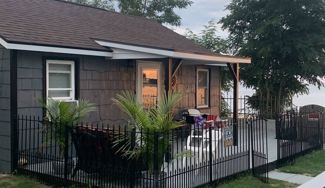 Location, location,!! Step out of your cottage right to the sandy beach!