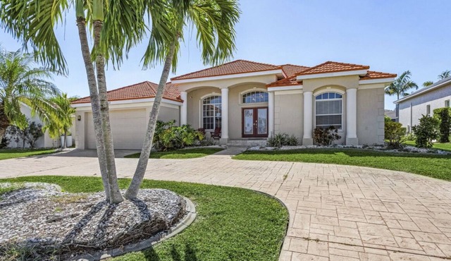 LOCATION! Modern waterfront home;1-block to FishermanVillage; HEATED SALT POOL