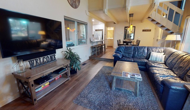 Lodge-Style Escape with A/C, BBQ & Walk to Spa