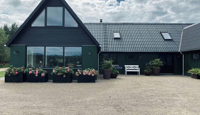 Lodge with private lake near Bidstrup Forest