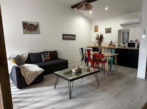 Loft chaleureux et confortable style Industriel