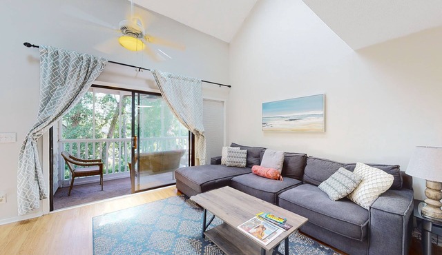 Loft condo near beach & golf with covered porch, tennis, balcony, & grill