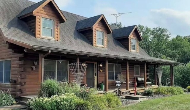 Log cabin home in charming setting