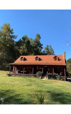 Log Cabin in the Field