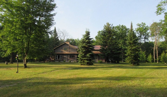 Log cabin in the woods, near trails, lake and golf courses