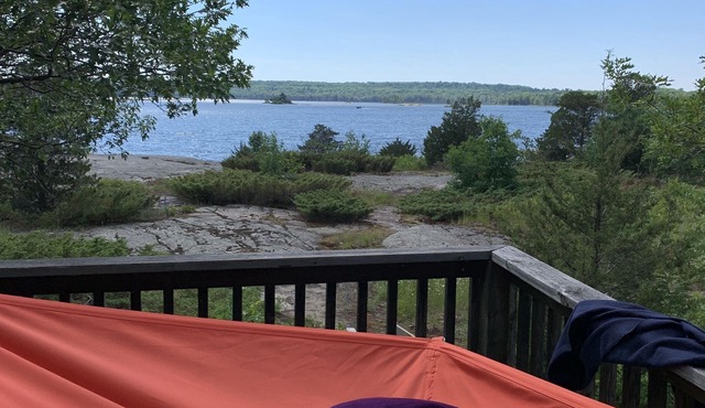 Log cabin island getaway on the shores of spectacular Georgian Bay