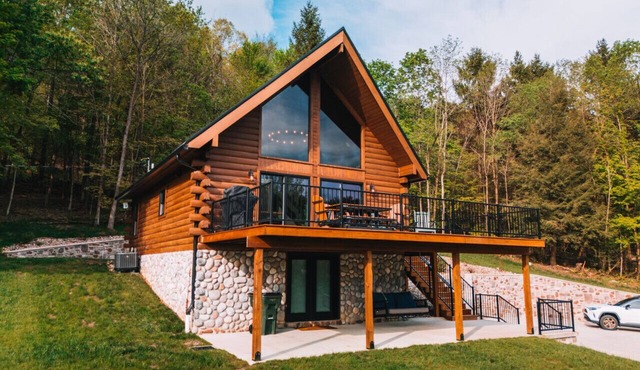 Log Cabin on 95-acres with 2 private lakes