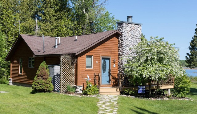 Log Cabin on the Canal of the Indian River between Burt Lake and Mullet Lake!